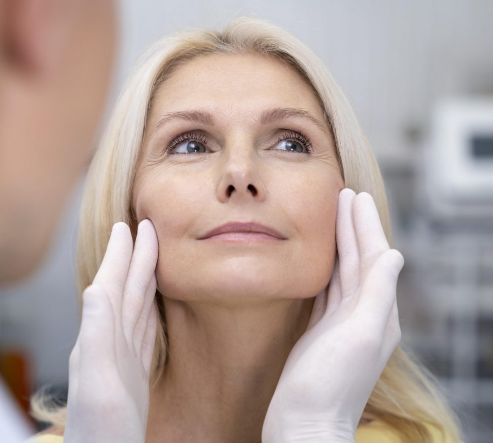 close-up-doctor-checking-smiley-woman